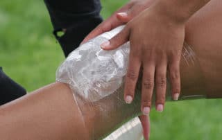 Sports Injuries Treatments, applying an icepack to injured area