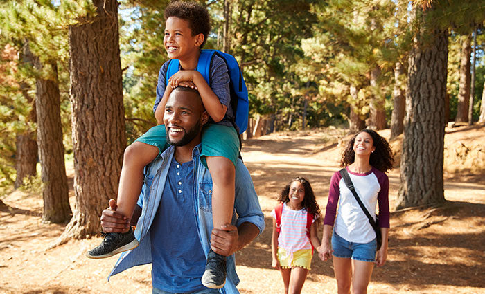 Family on a hike enjoying an active summer