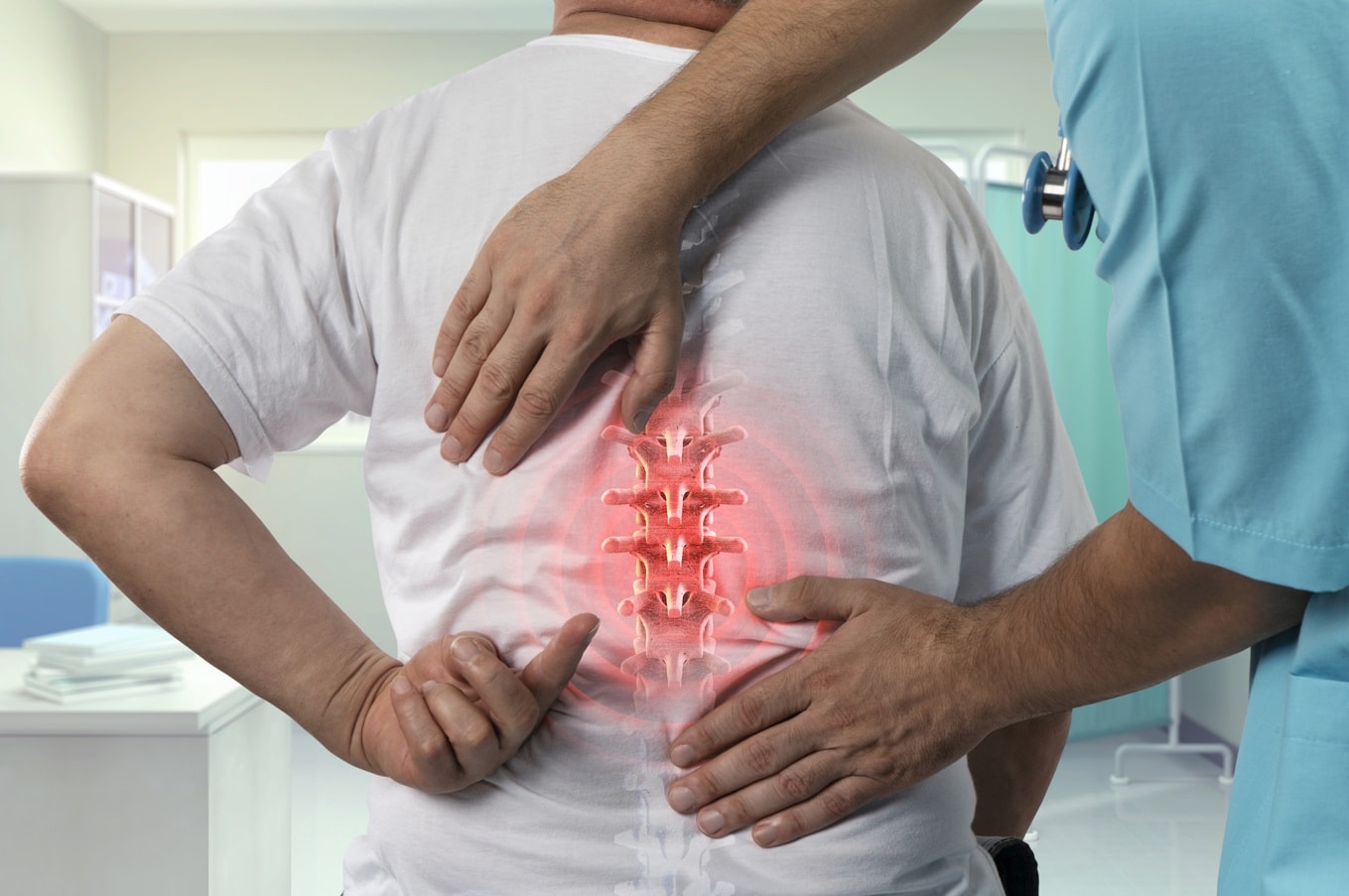 common spine problems - doctor examining patient's spine